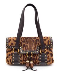 An Yves Saint Laurent Printed Calf Hair Shoulder Bag, 11" x 7" x 4".