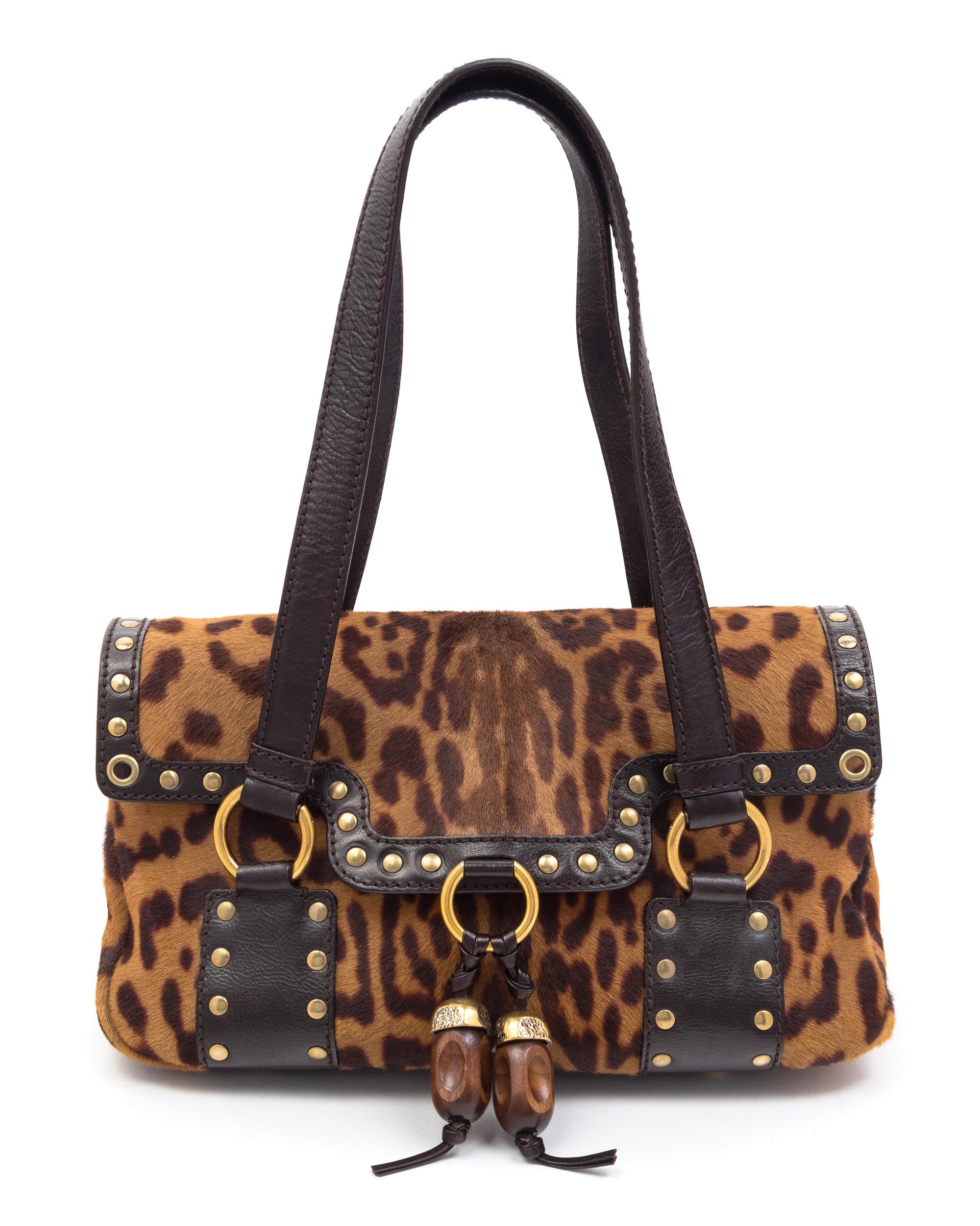 An Yves Saint Laurent Printed Calf Hair Shoulder Bag, 11" x 7" x 4".