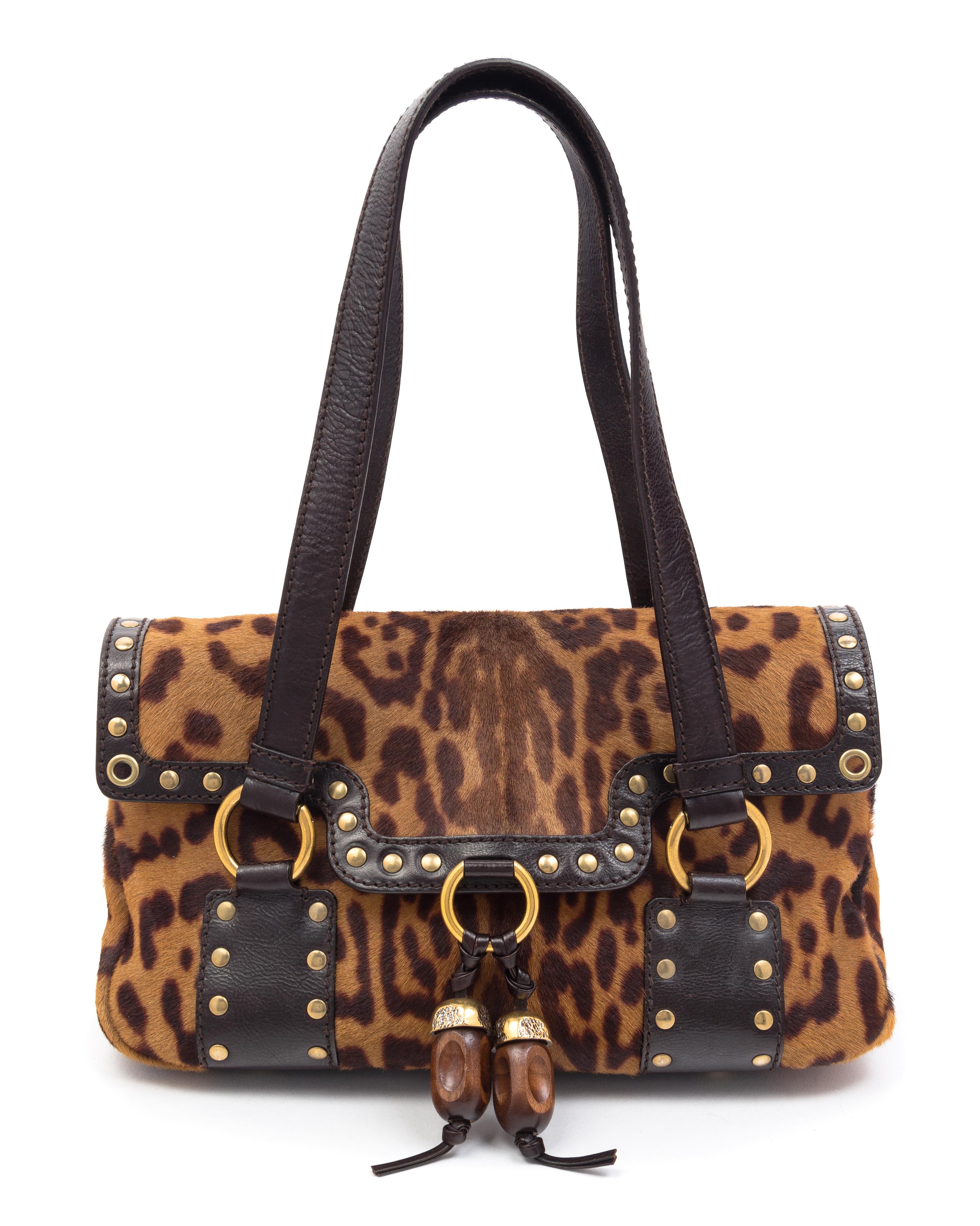 An Yves Saint Laurent Printed Calf Hair Shoulder Bag, 11" x 7" x 4".