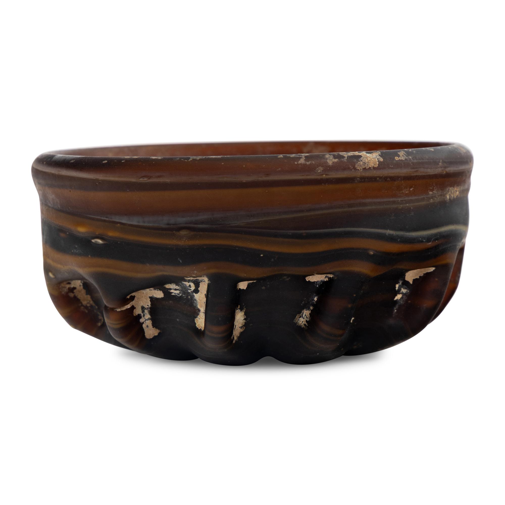 A Byzantine or Islamic Style Amber Glass Bowl