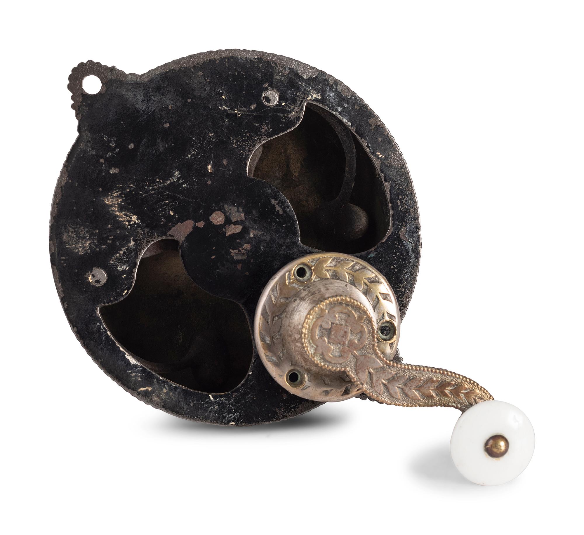 A Brass and Cast Iron Hand-Crank Door Bell