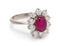 An 18 Karat White Gold, Ruby, and Diamond Ring,