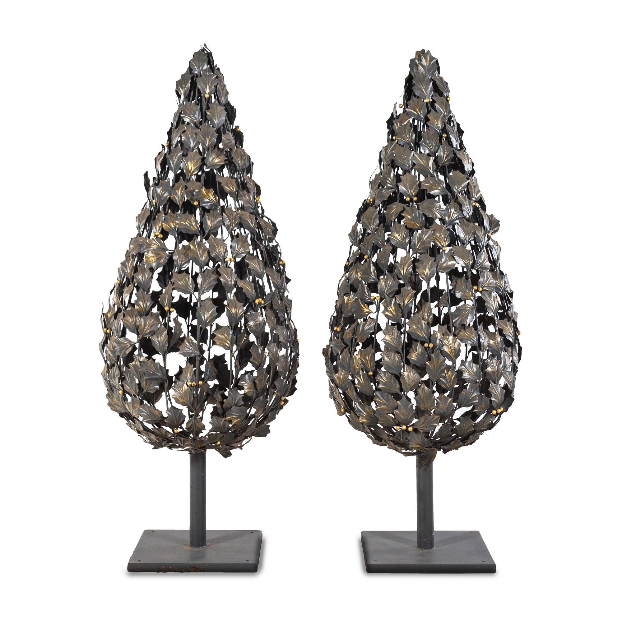 A Pair of Painted Metal Garden Ornaments