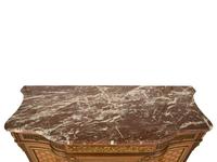 A Louis XVI Style Gilt Bronze Mounted Kingwood and Marquetry Marble-Top Commode