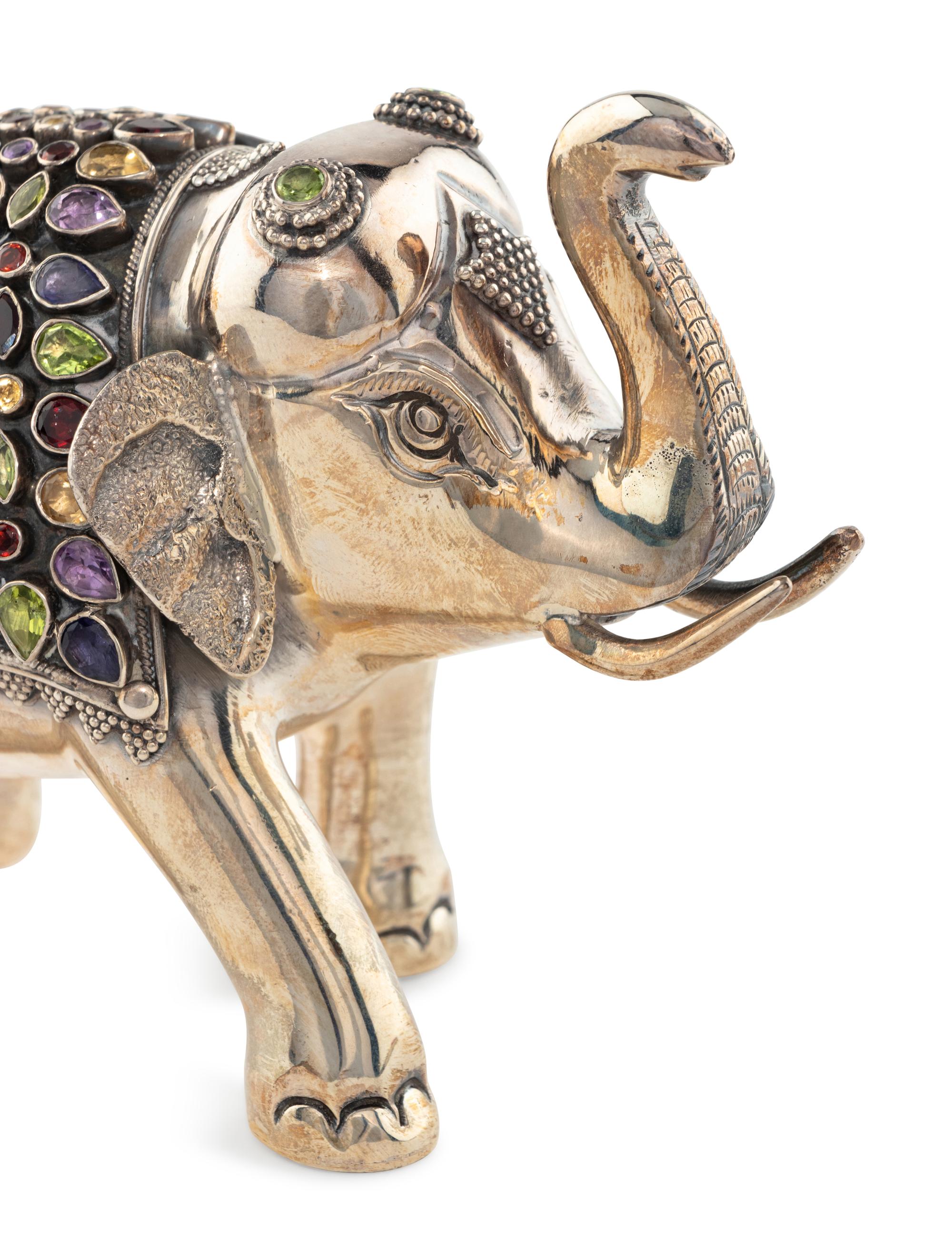 An East Indian Silver Plated and Jeweled Figure of an Elephant