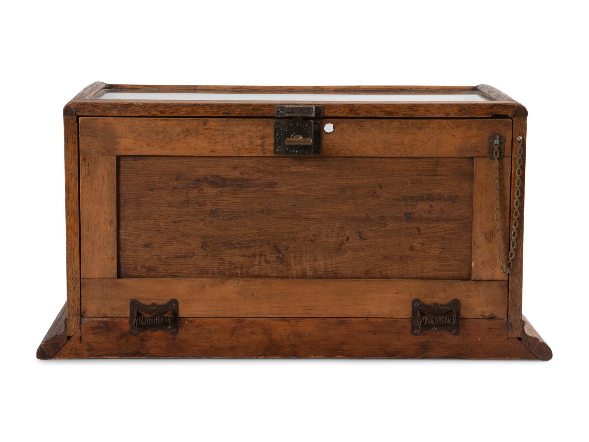 A Domed Oak Frame Display Case