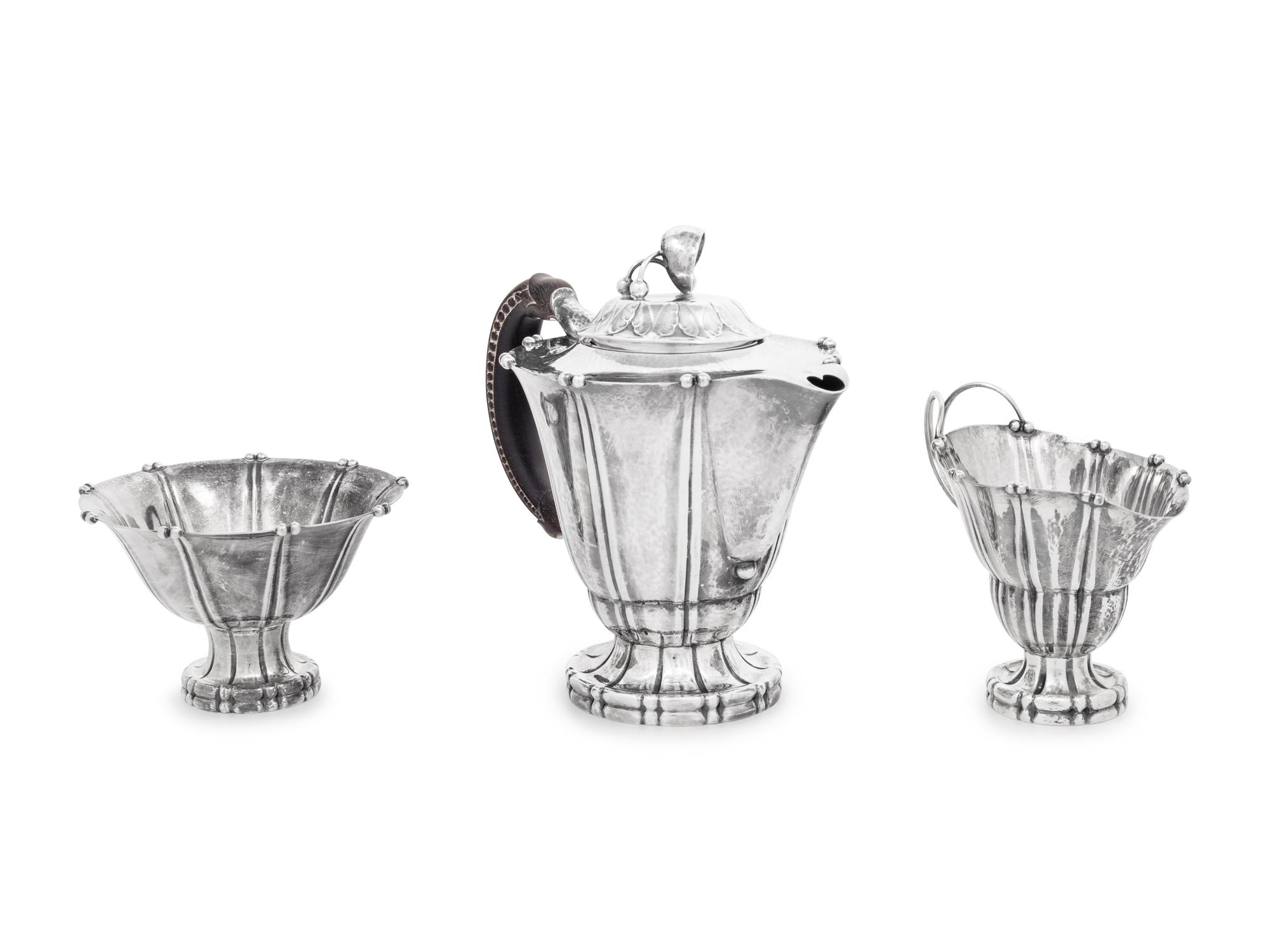 A Georg Jensen Three-Piece Silver Coffee Service