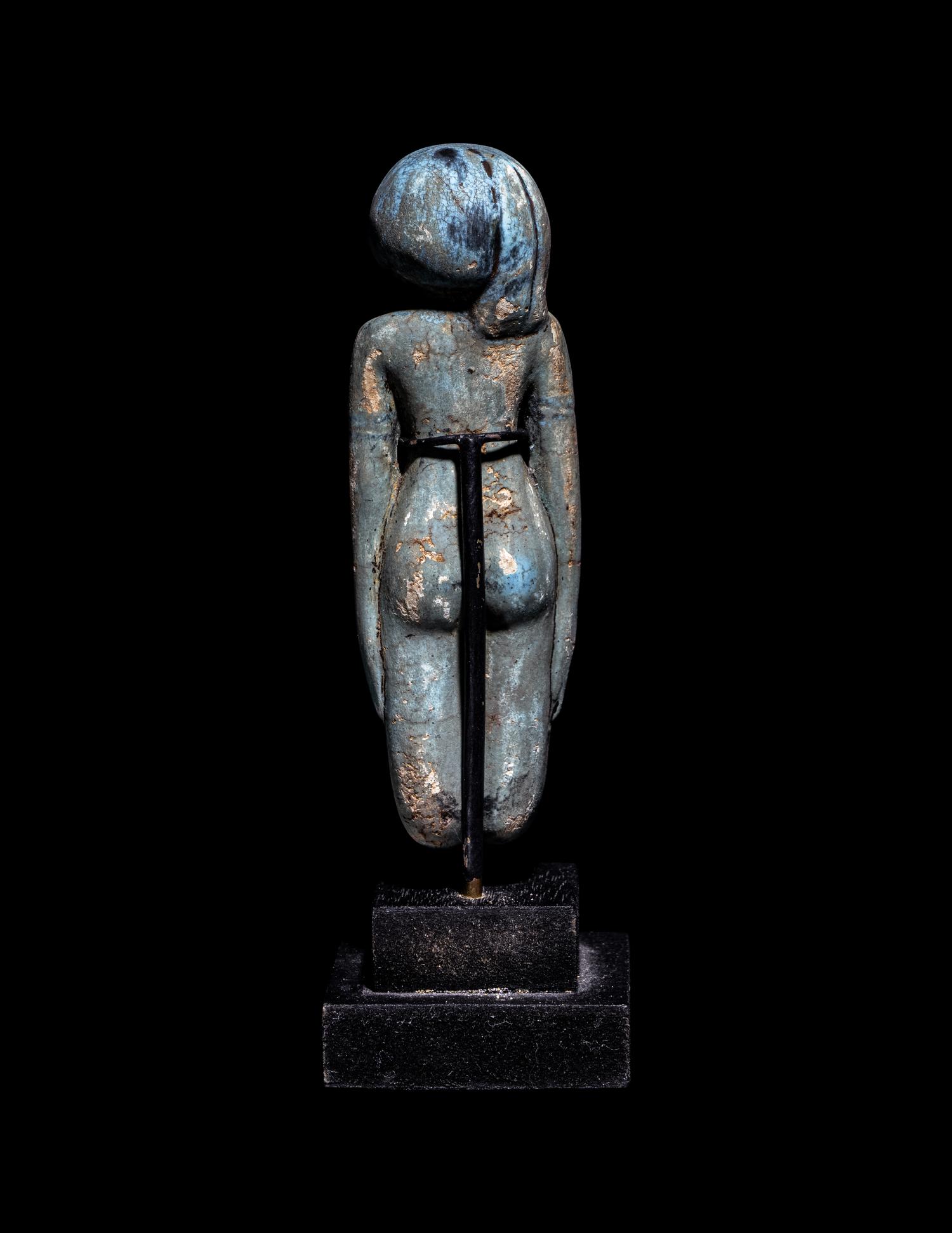 An Egyptian Faience Female Figure
