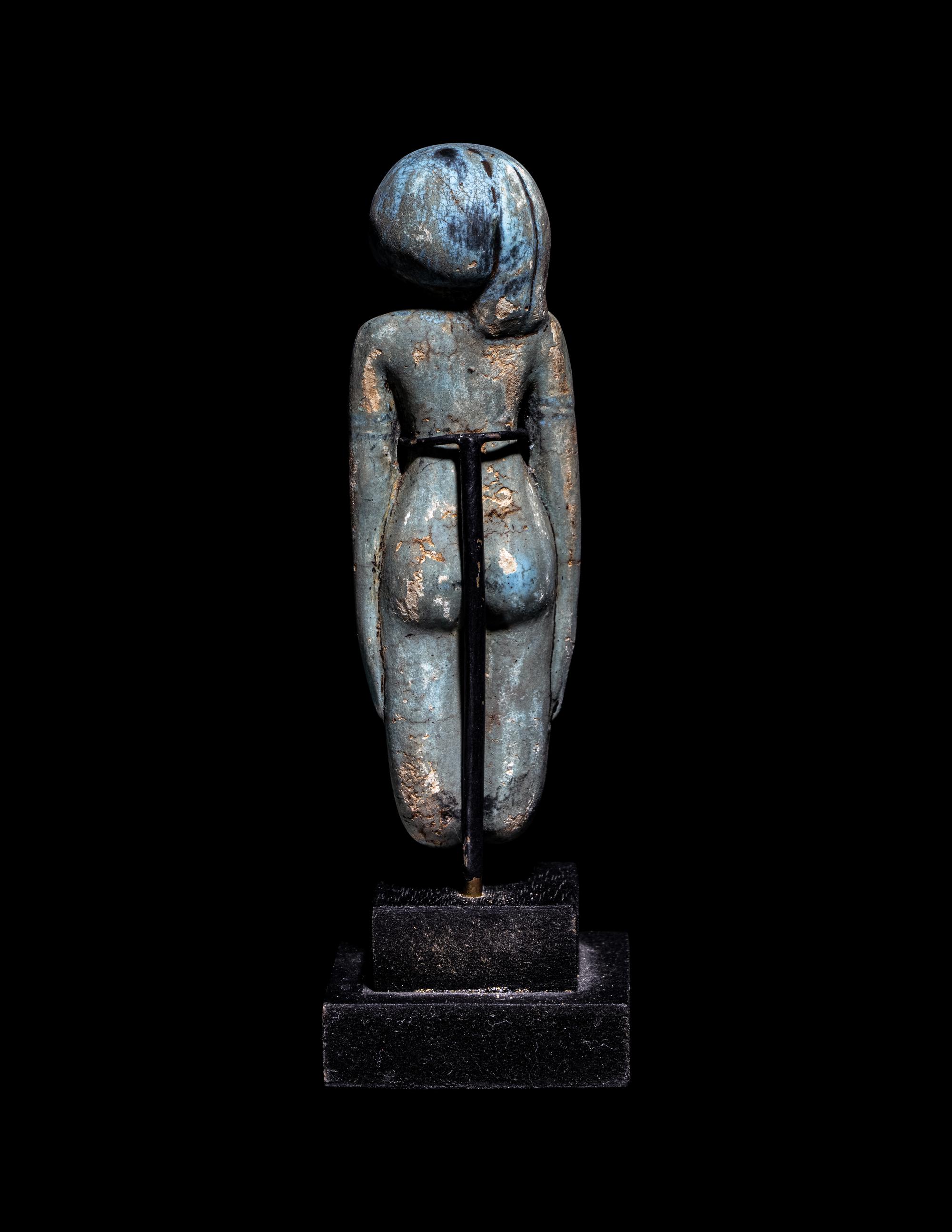 An Egyptian Faience Female Figure