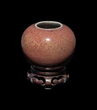 Two Chinese Monochrome Glazed Porcelain Wares, 19th-20th Century 晚清/民國 豇豆紅水呈及黃釉暗刻卷草紋賞瓶