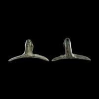A Pair of Etruscan Bronze Vessel Handles