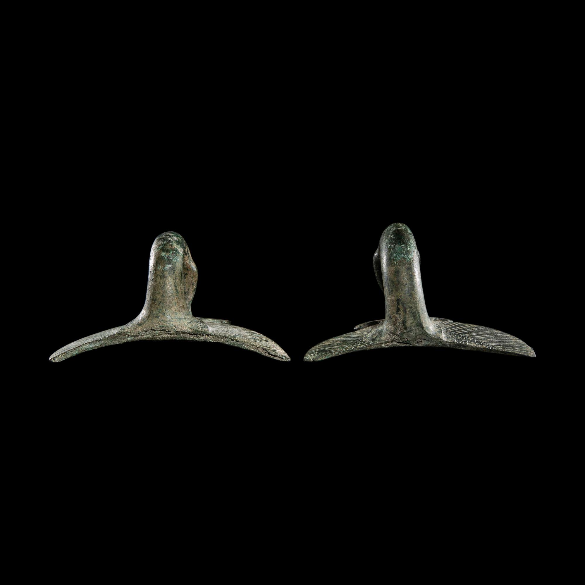 A Pair of Etruscan Bronze Vessel Handles
