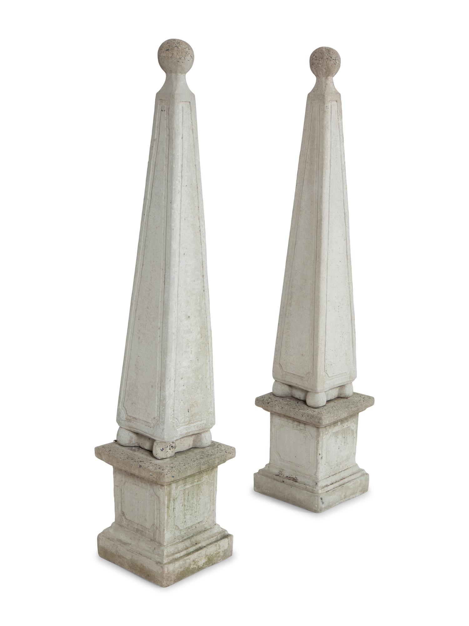 A Pair of Cast Stone Obelisks on Bases