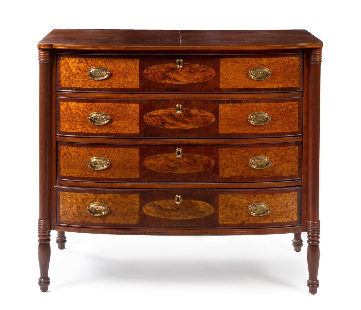 An American Mahogany and Bird's Eye Maple Bow Front Chest of Drawers Height 38 x width 43 x depth 22 1/4 inches. — NEW ENGLAND, 19TH CENTURY WITH LATER ALTERATIONS