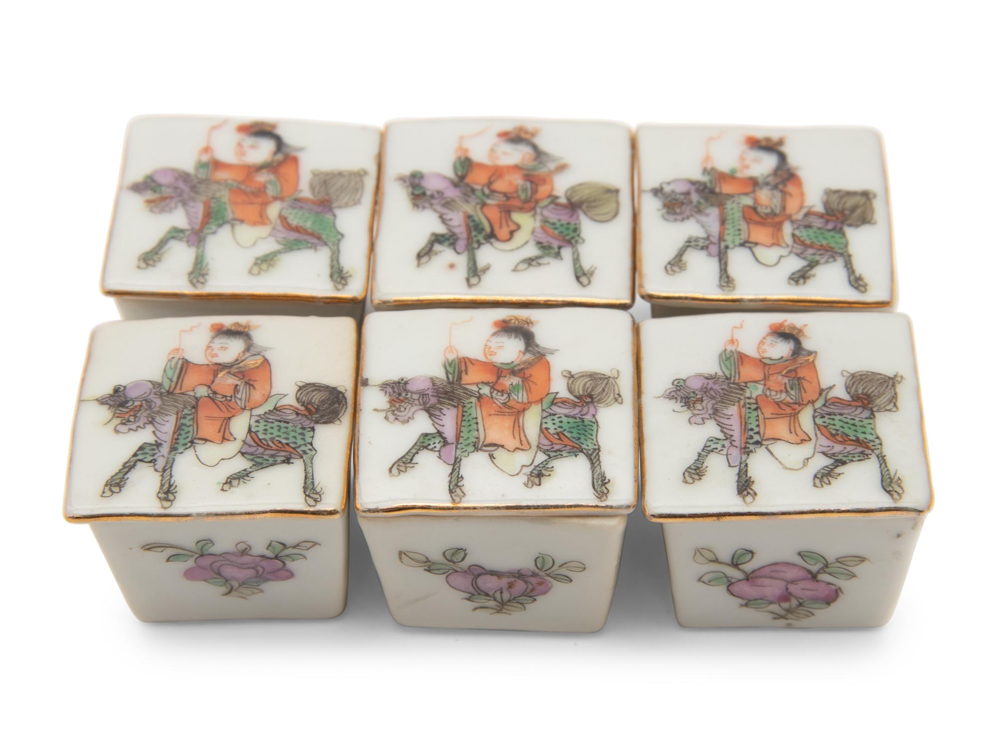 A Set of Six Small Chinese Famille Rose Porcelain Covered Boxes