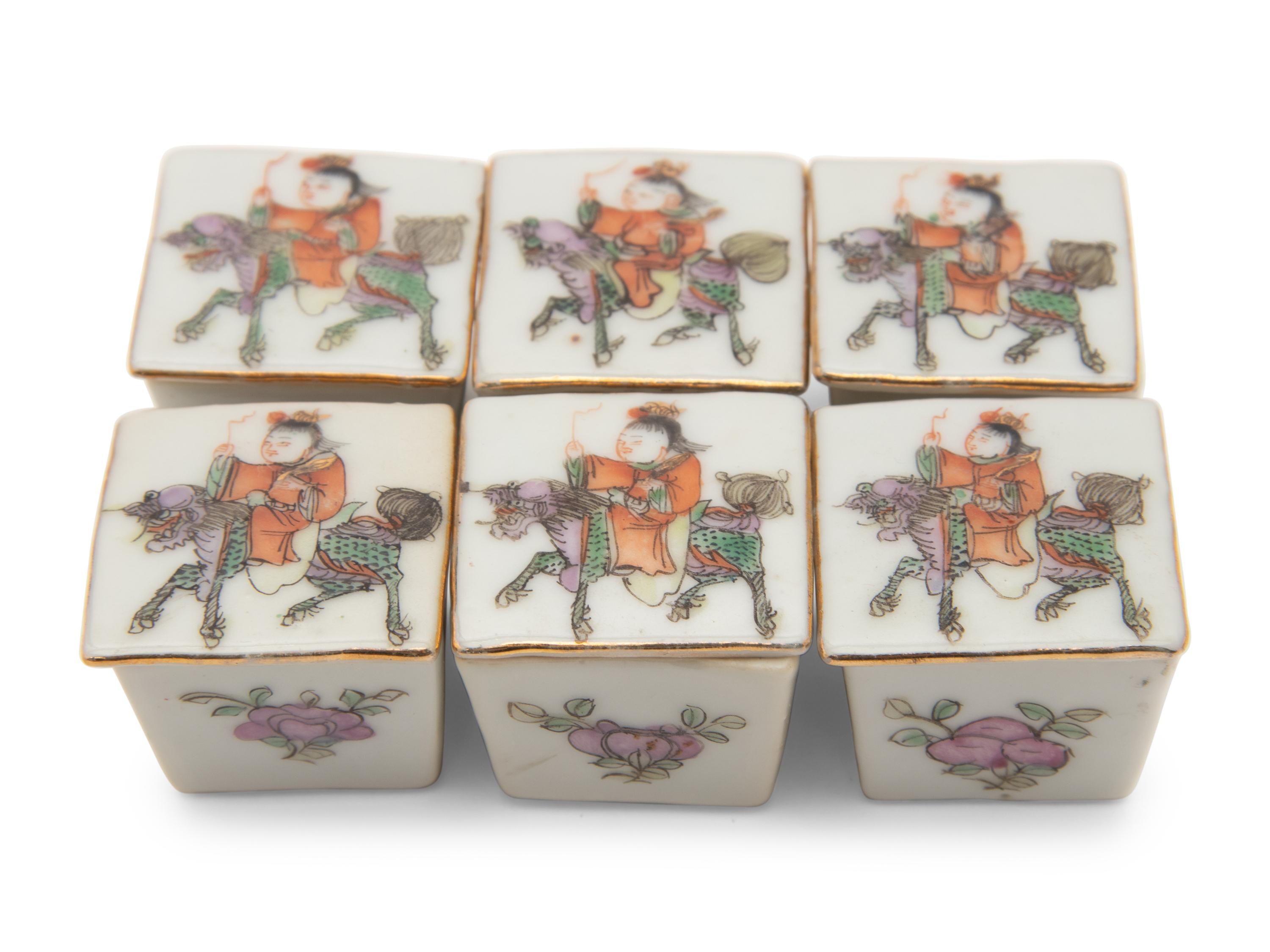 A Set of Six Small Chinese Famille Rose Porcelain Covered Boxes