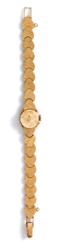 A 14 Karat Yellow Gold Surprise Wristwatch, Regency, 13.80 dwts.