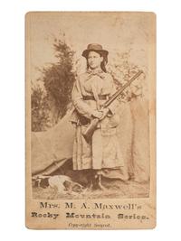[COLORADO] -- [MAXWELL, Martha A.]. CDV of Martha A. Maxwell in hunting attire, armed with rifle. Ca 1875.