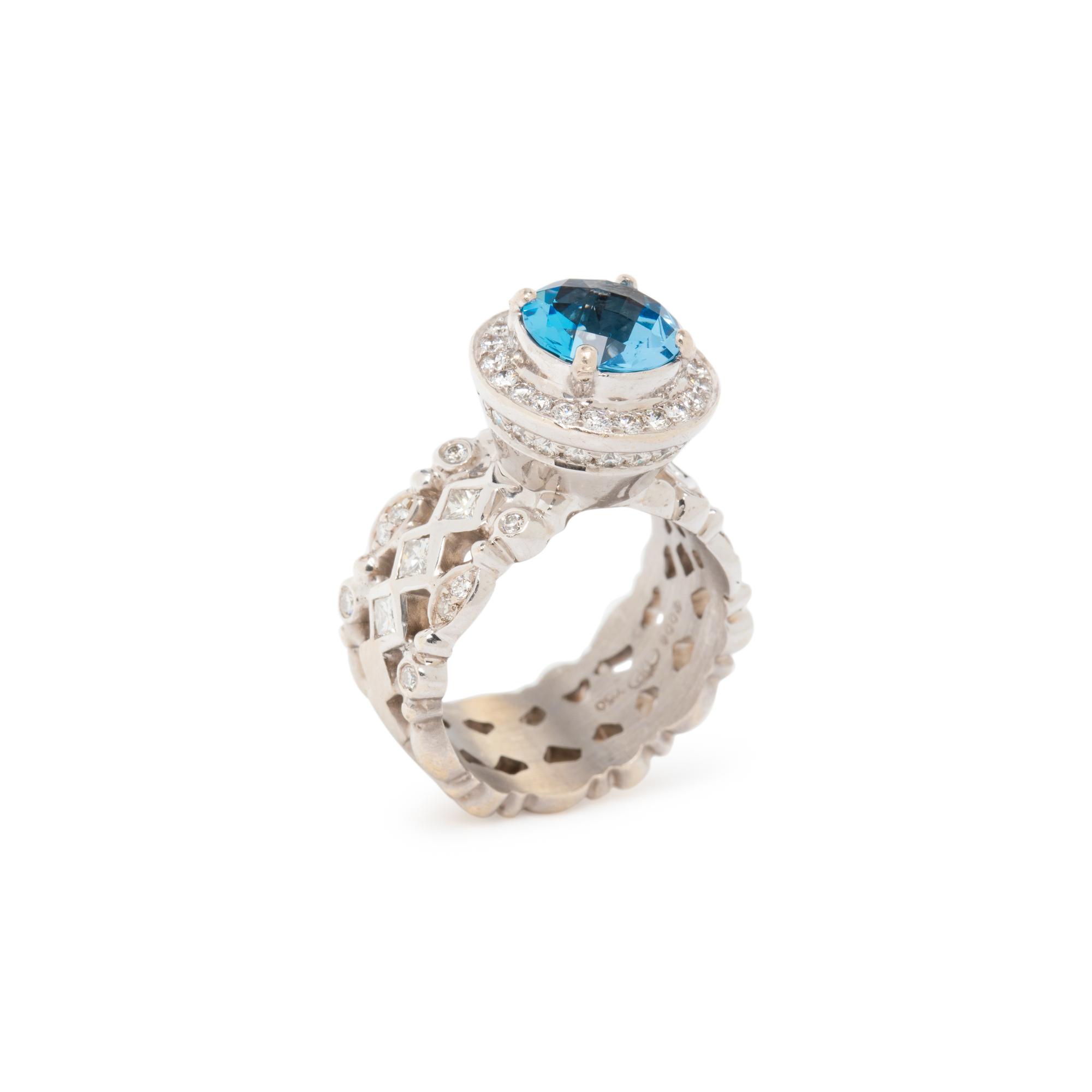 DORIS PANOS, BLUE TOPAZ AND DIAMOND RING