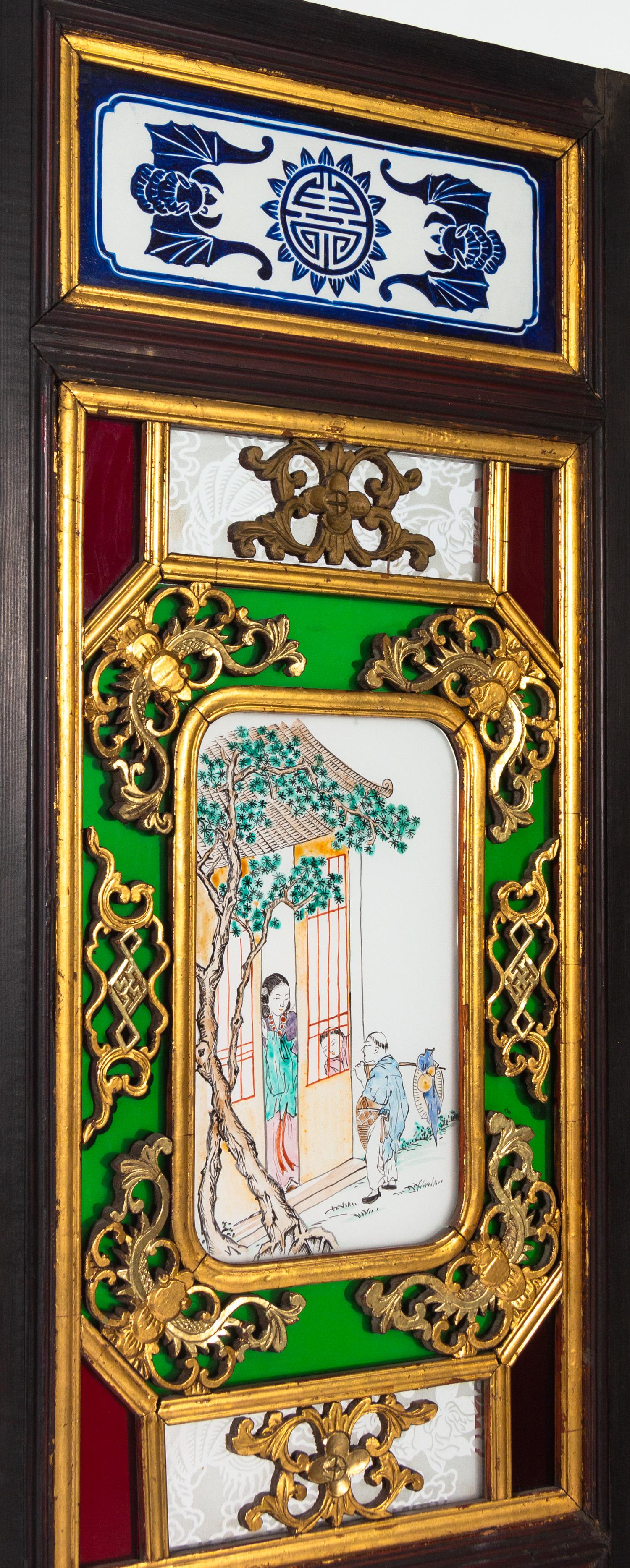 A Chinese Painted Glass Inset Gilt Decorated Hardwood Six-Panel Floor Screen