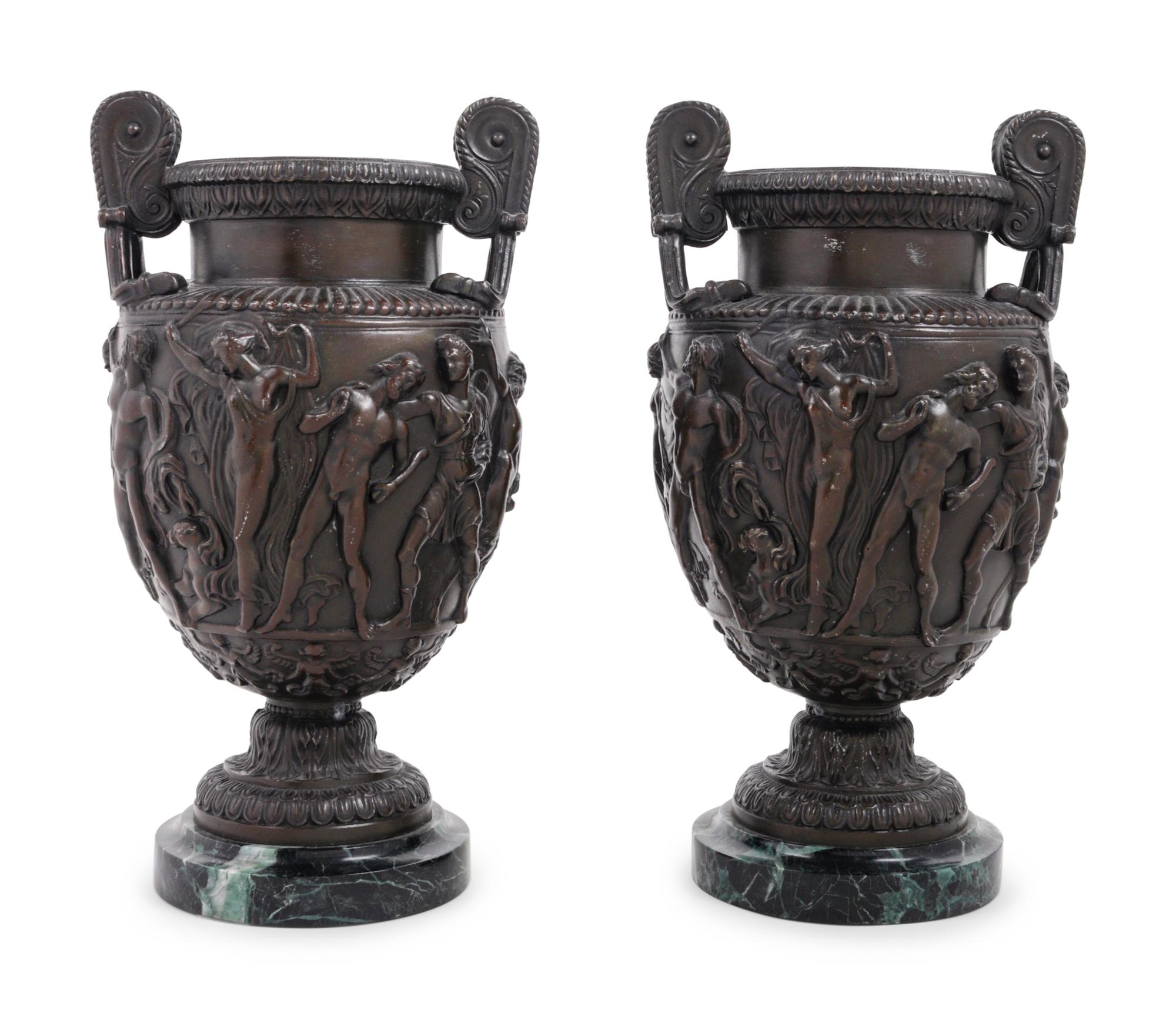 A Pair of Grand Tour Cast Metal and Marble Urns