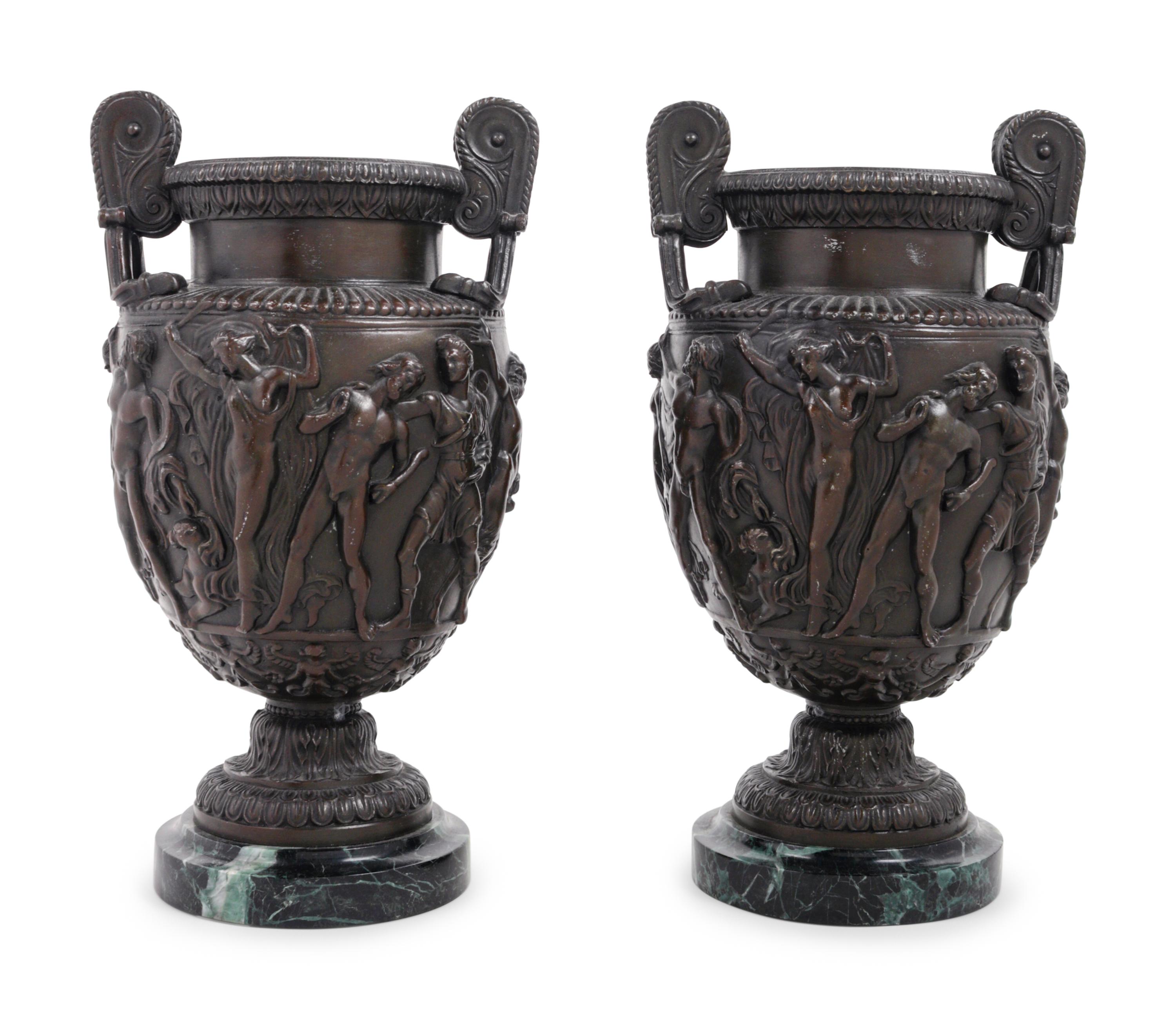 A Pair of Grand Tour Cast Metal and Marble Urns