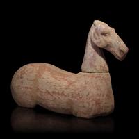 A Chinese Pottery Figure of a Recumbent Horse, Han Dynasty — 漢 彩繪灰陶馬