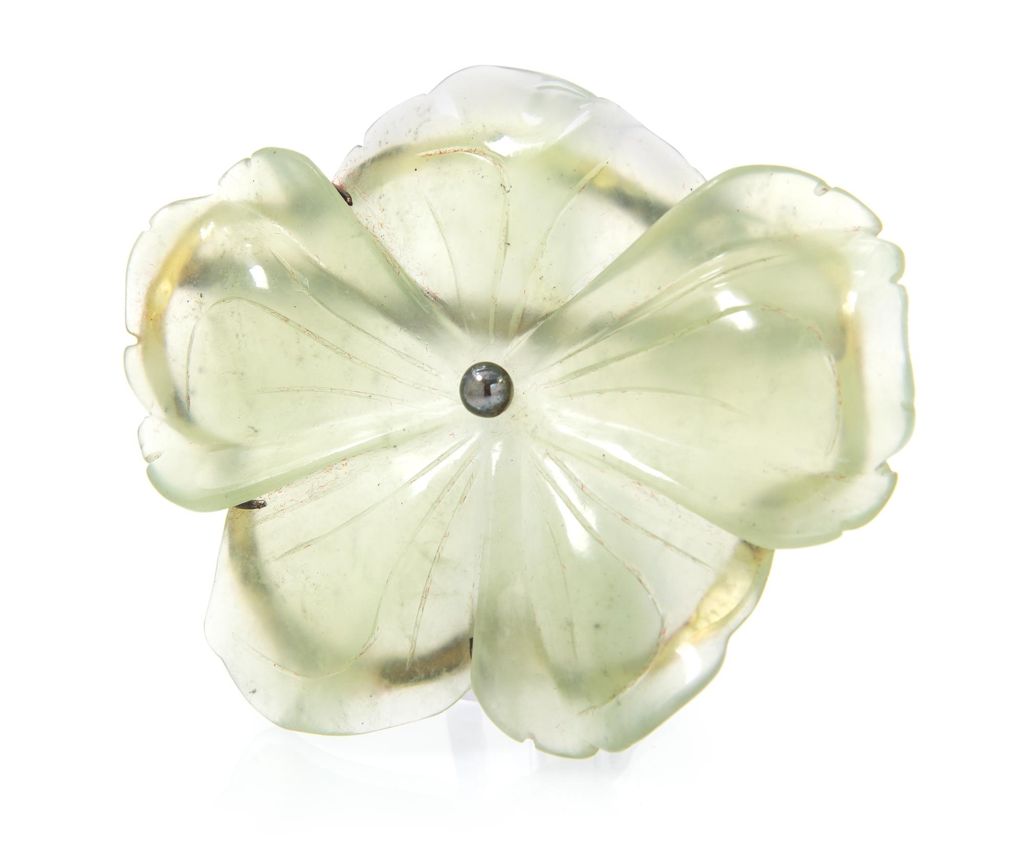 A Sterling Silver and Carved Hardstone Flower Brooch, 28.40 dwts.
