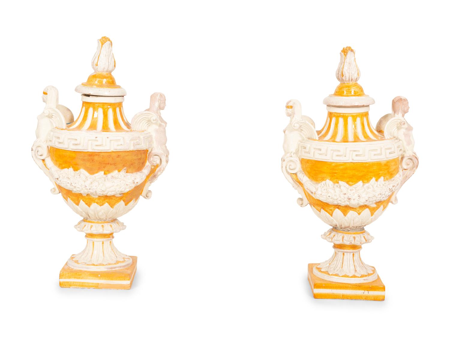 A Pair of Italian Glazed Terracotta Covered Urns