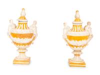 A Pair of Italian Glazed Terracotta Covered Urns