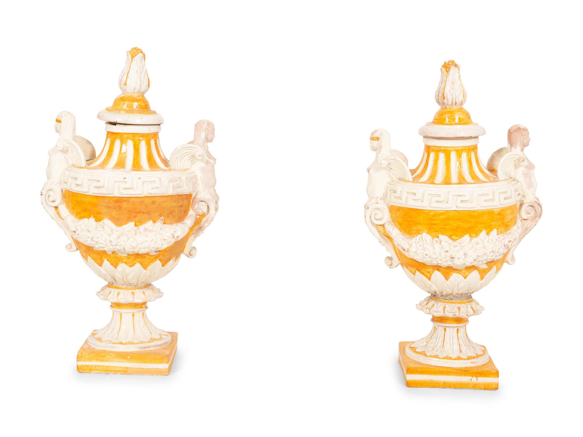 A Pair of Italian Glazed Terracotta Covered Urns