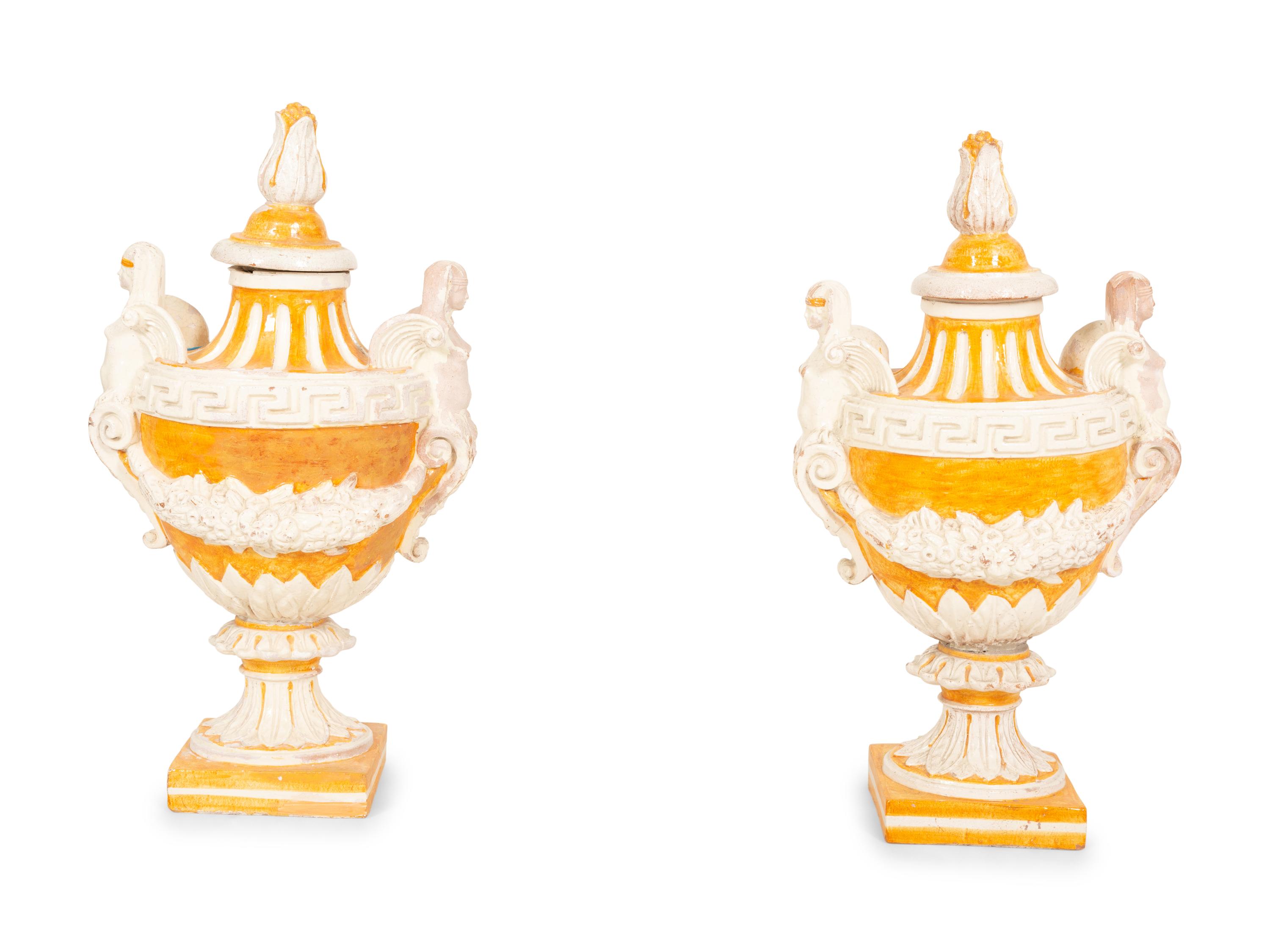 A Pair of Italian Glazed Terracotta Covered Urns