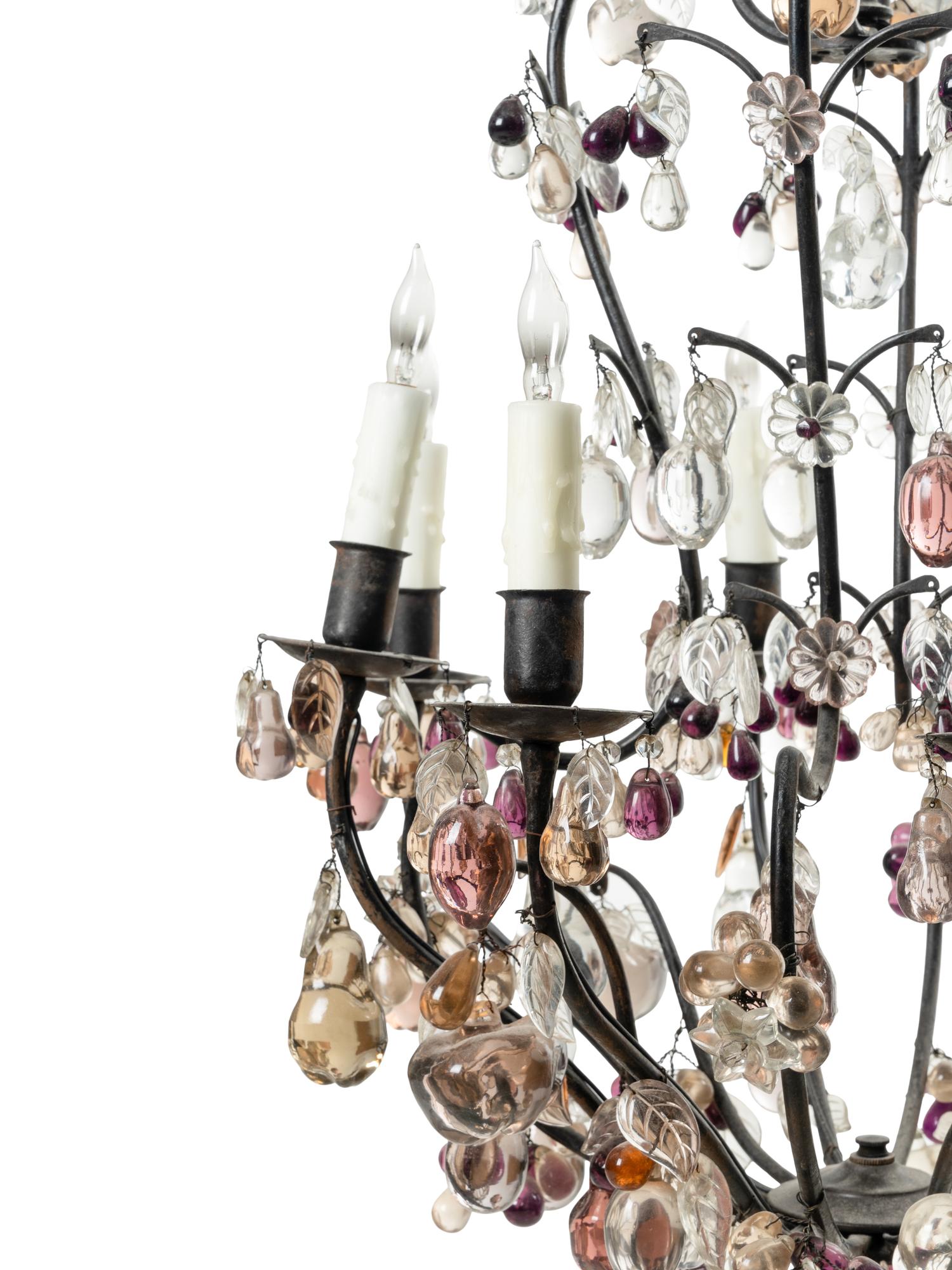 A Louis XV Style Iron and Glass Eight-Light Chandelier