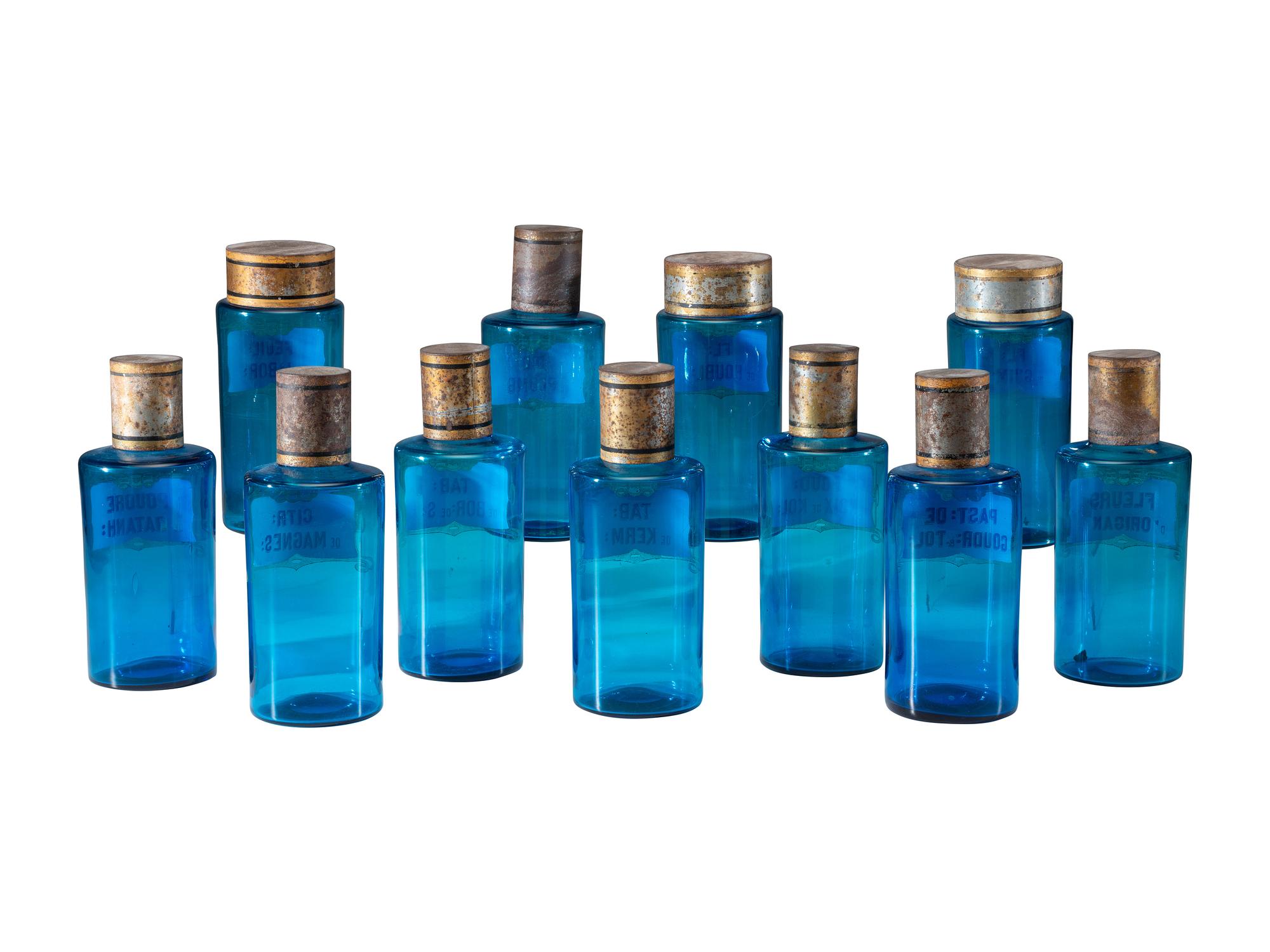 Eleven Glass Apothecary Bottles