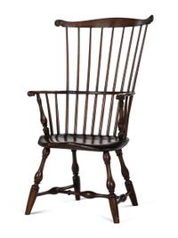 A Volute Carved Comb-Back Knuckle-Arm Windsor Armchair