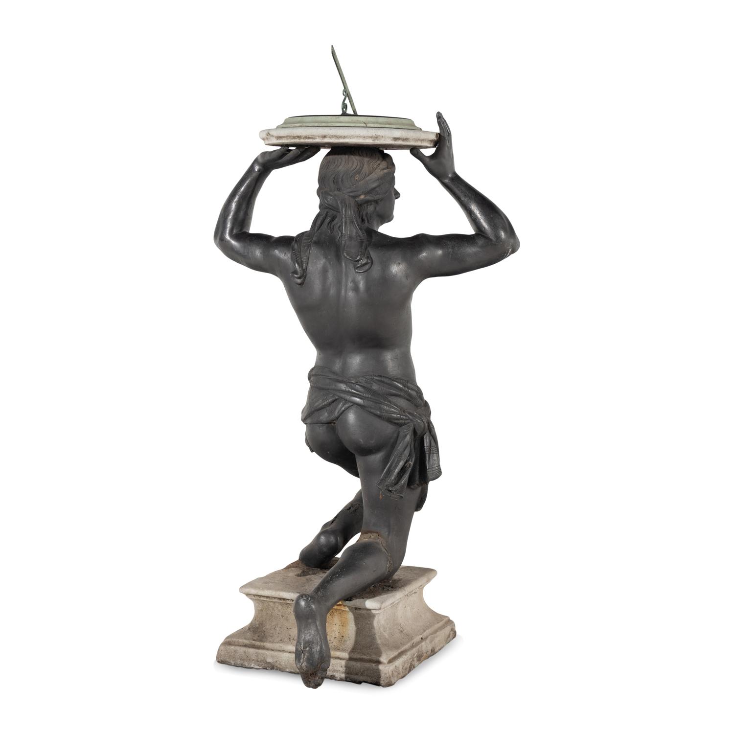 A Cast Lead Figural Sundial
