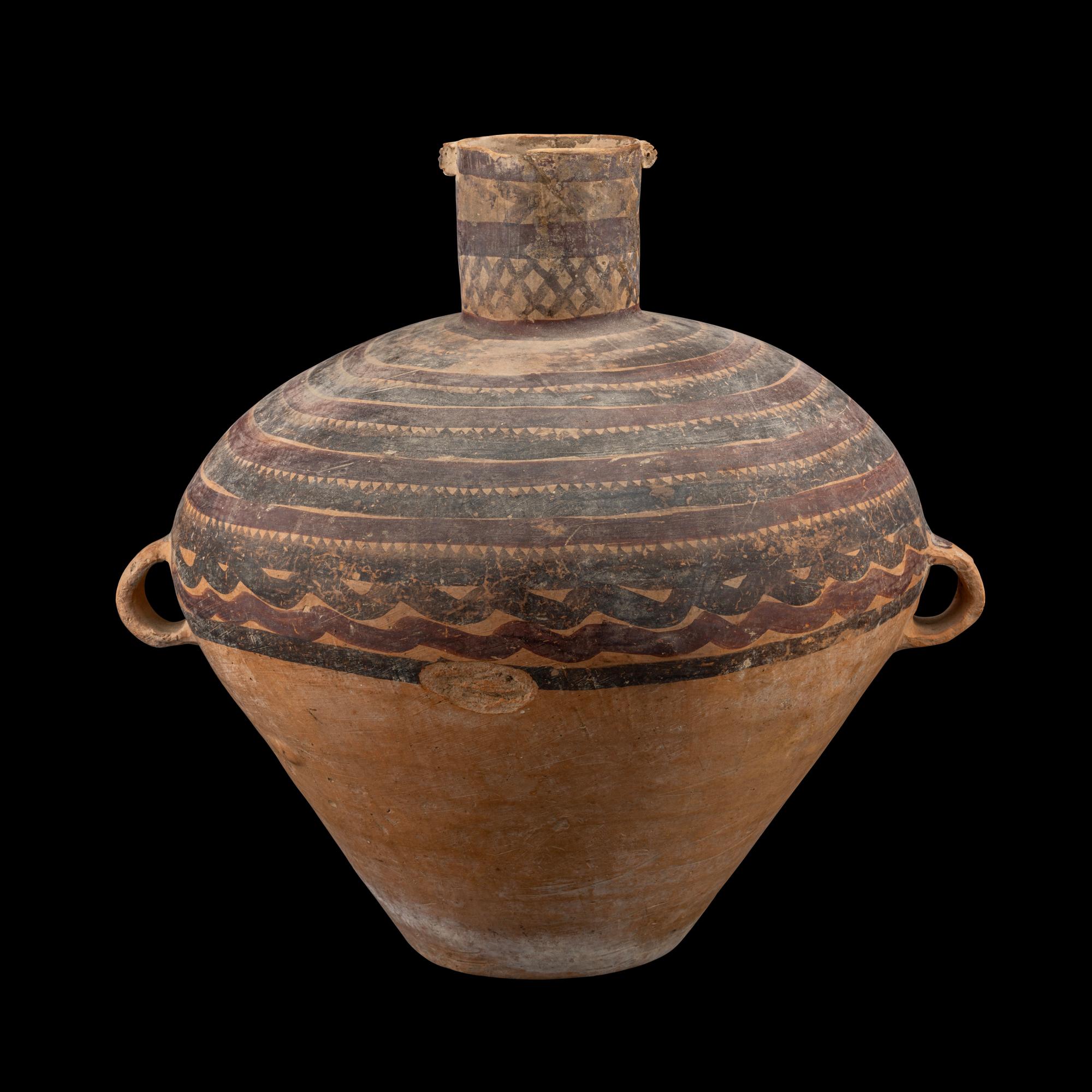 A Chinese Painted Pottery Handled Jar