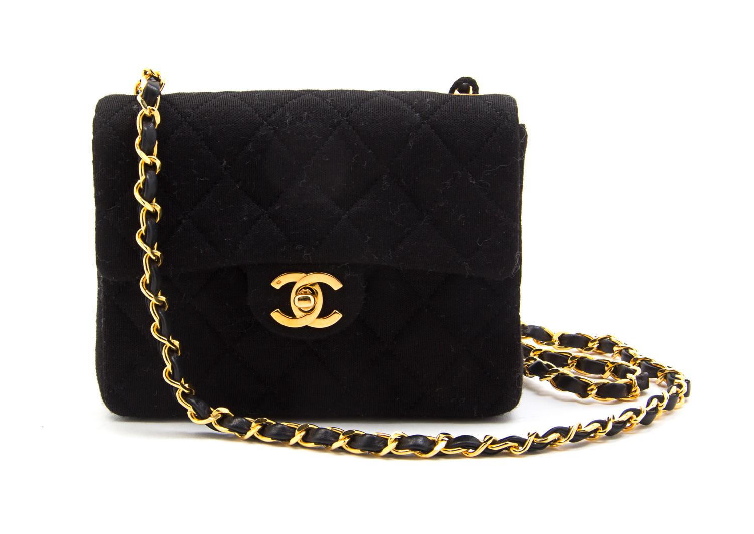 A Chanel Black Quilted Wool Jersey Flap Bag, 7 x 5 1/2 x 2 1/2 inches.