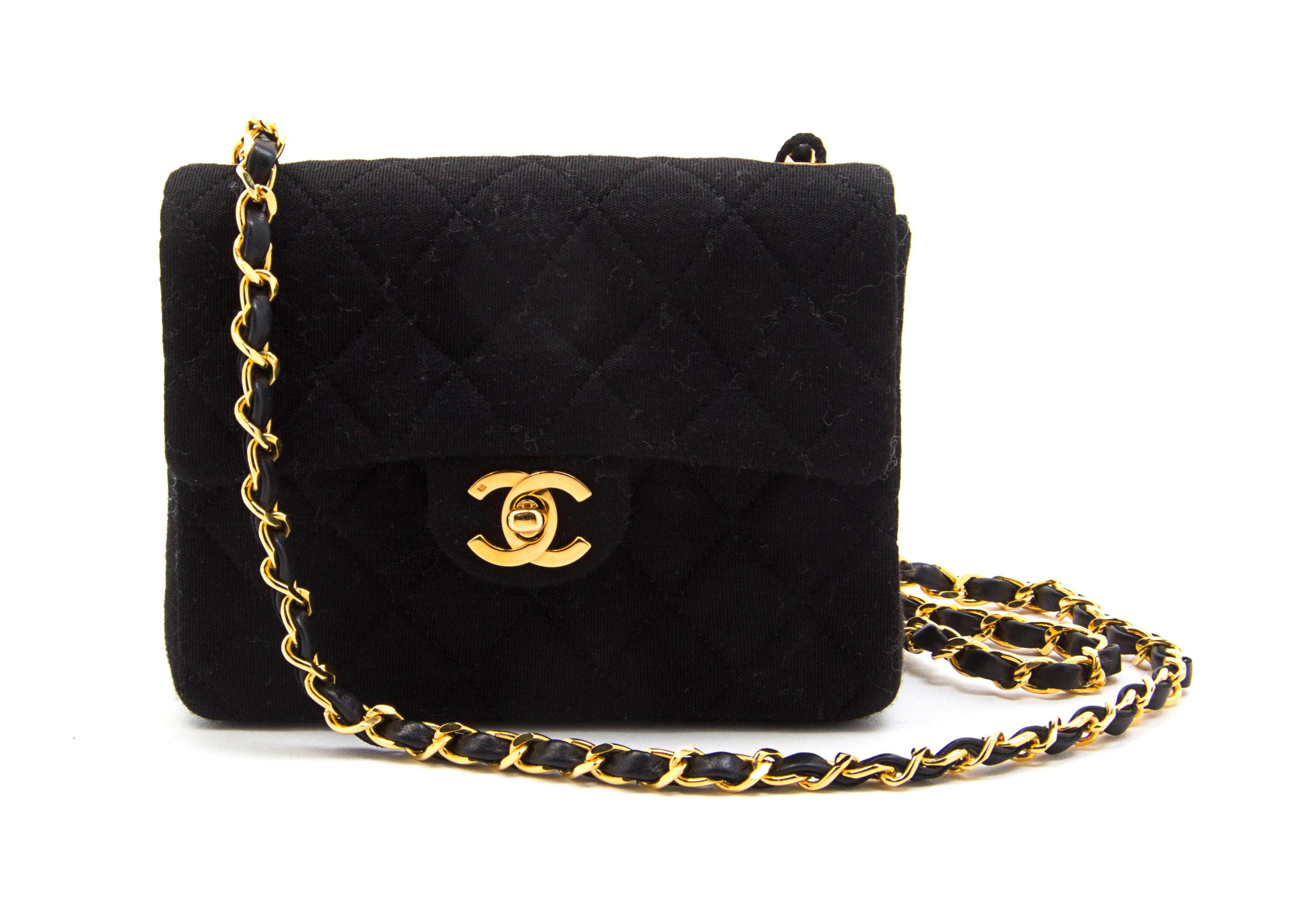 A Chanel Black Quilted Wool Jersey Flap Bag, 7 x 5 1/2 x 2 1/2 inches.