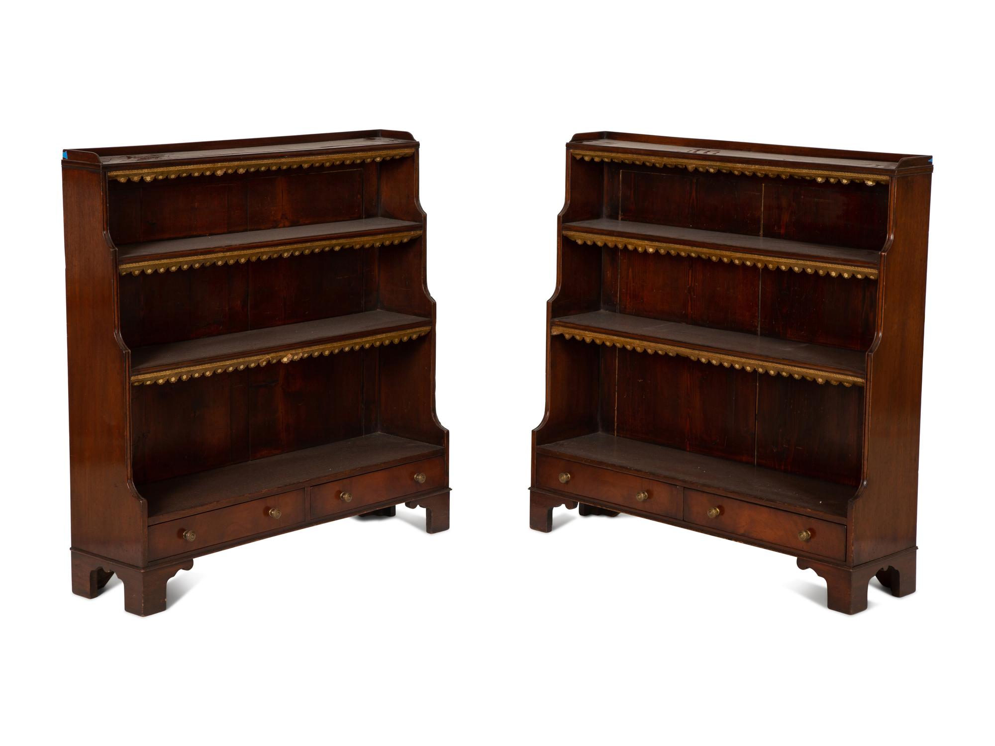 A Pair of Regency Style Mahogany Waterfall Bookcases — 20th Century