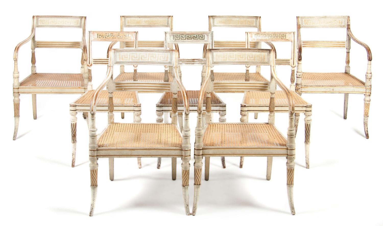 An Assembled Set of Eleven Regency Style Painted Dining Chairs, Height 32 1/2 inches.