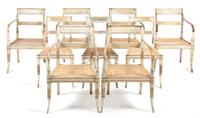 An Assembled Set of Eleven Regency Style Painted Dining Chairs, Height 32 1/2 inches.