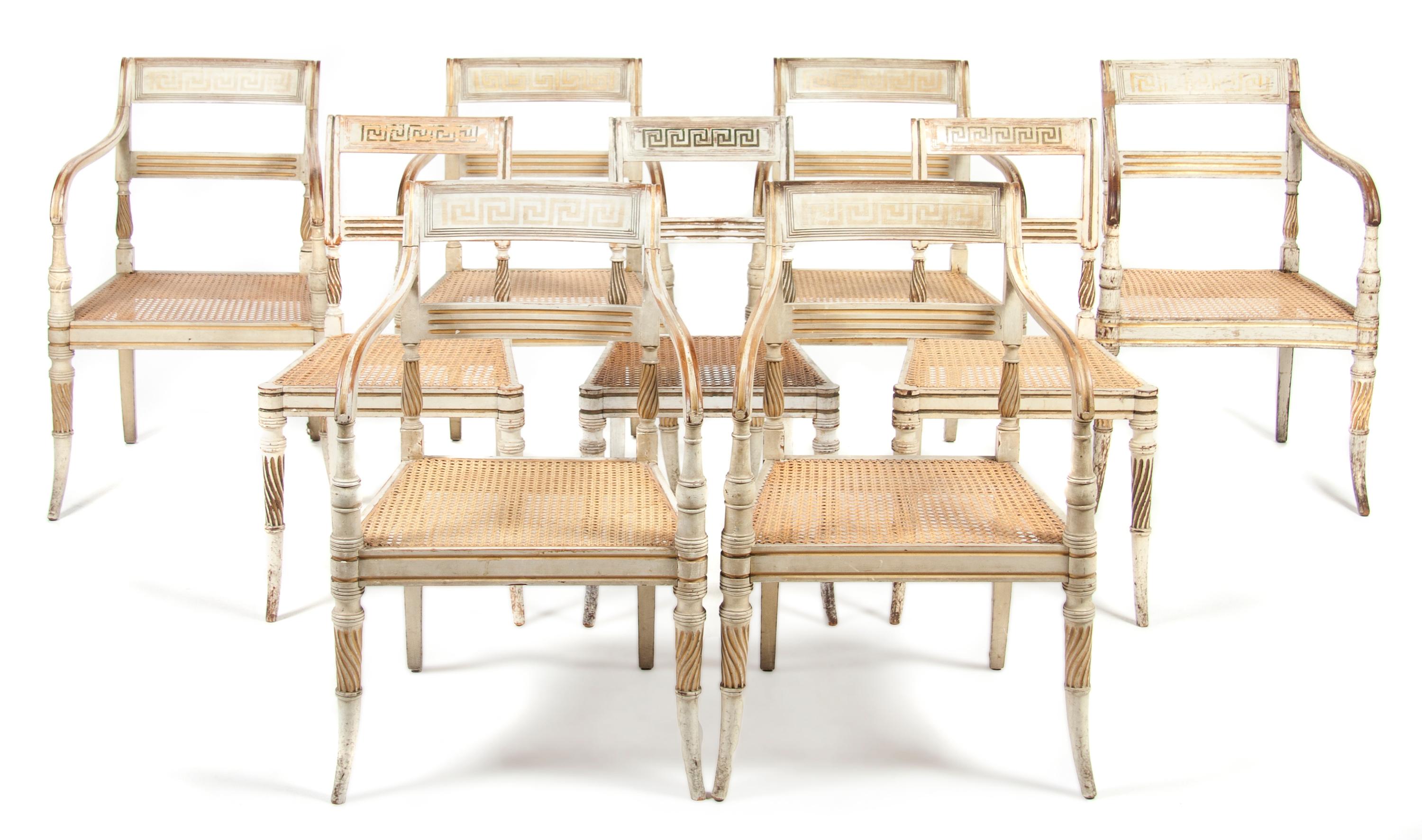 An Assembled Set of Eleven Regency Style Painted Dining Chairs, Height 32 1/2 inches.