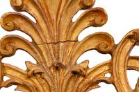 An Italian Baroque Style Giltwood Mirror