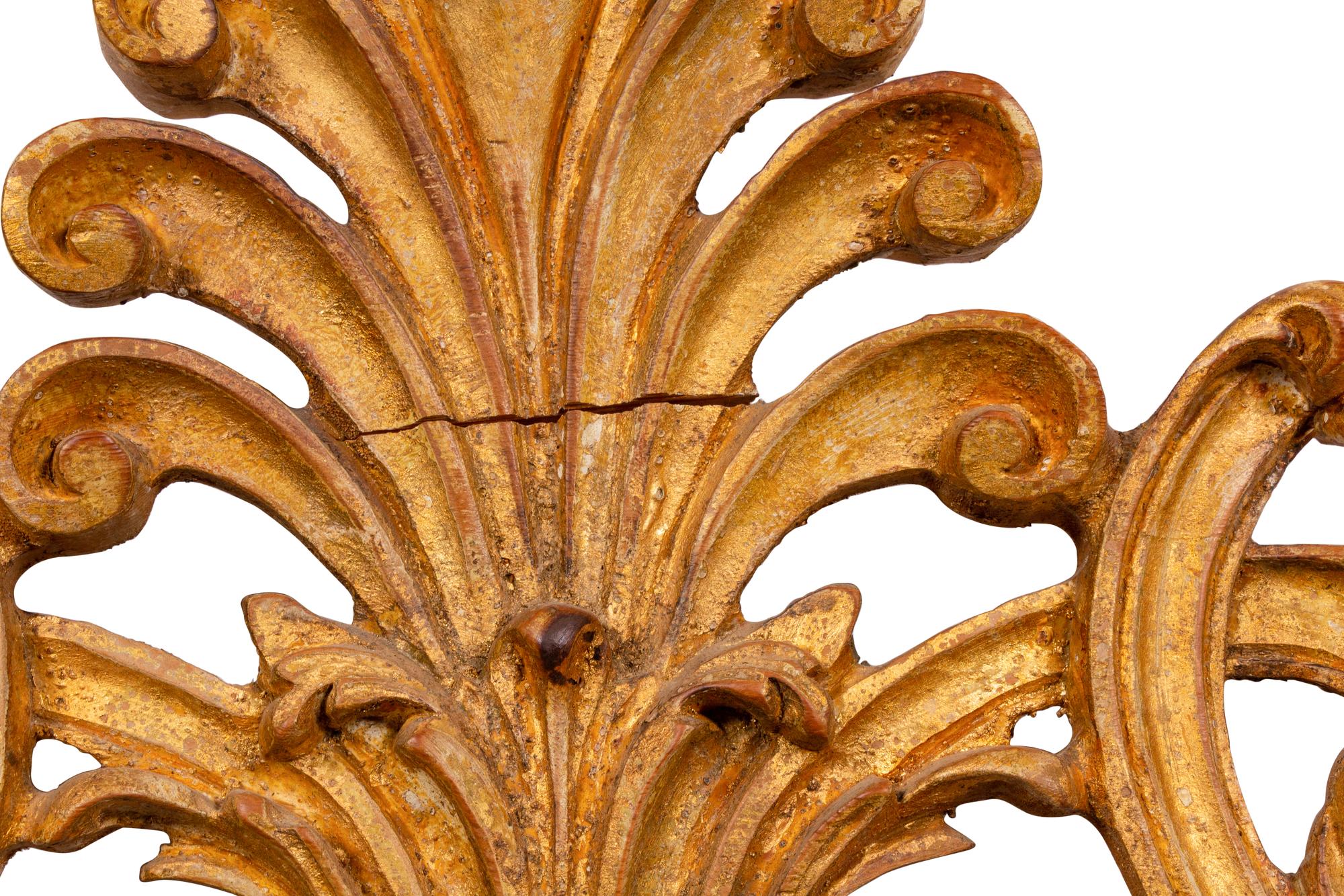An Italian Baroque Style Giltwood Mirror