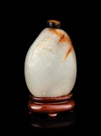 A Chinese White and Russet Jade Pebble-Form Snuff Bottle