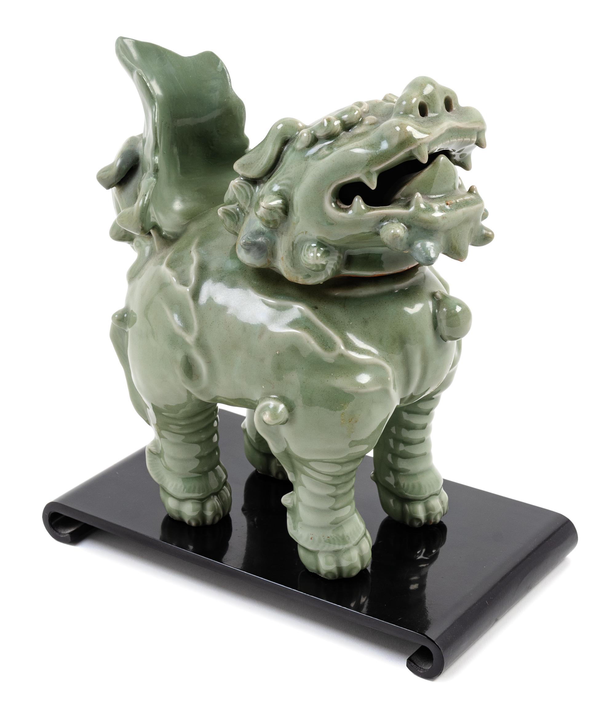 A Celadon Glazed Porcelain Pixiu- Form Incense Burner Height 12 inches.