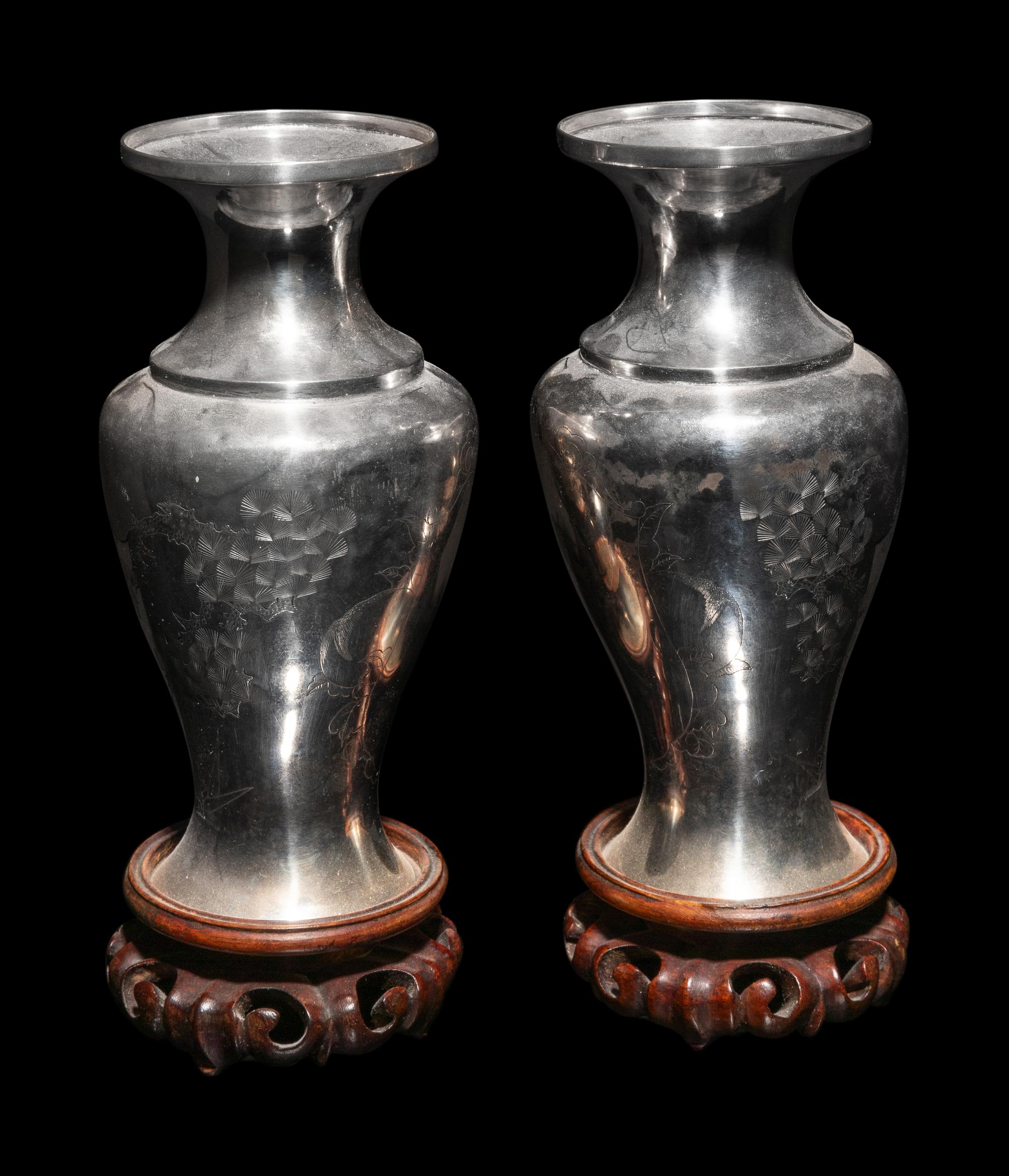 A Pair of Japanese Incised Silver Vases