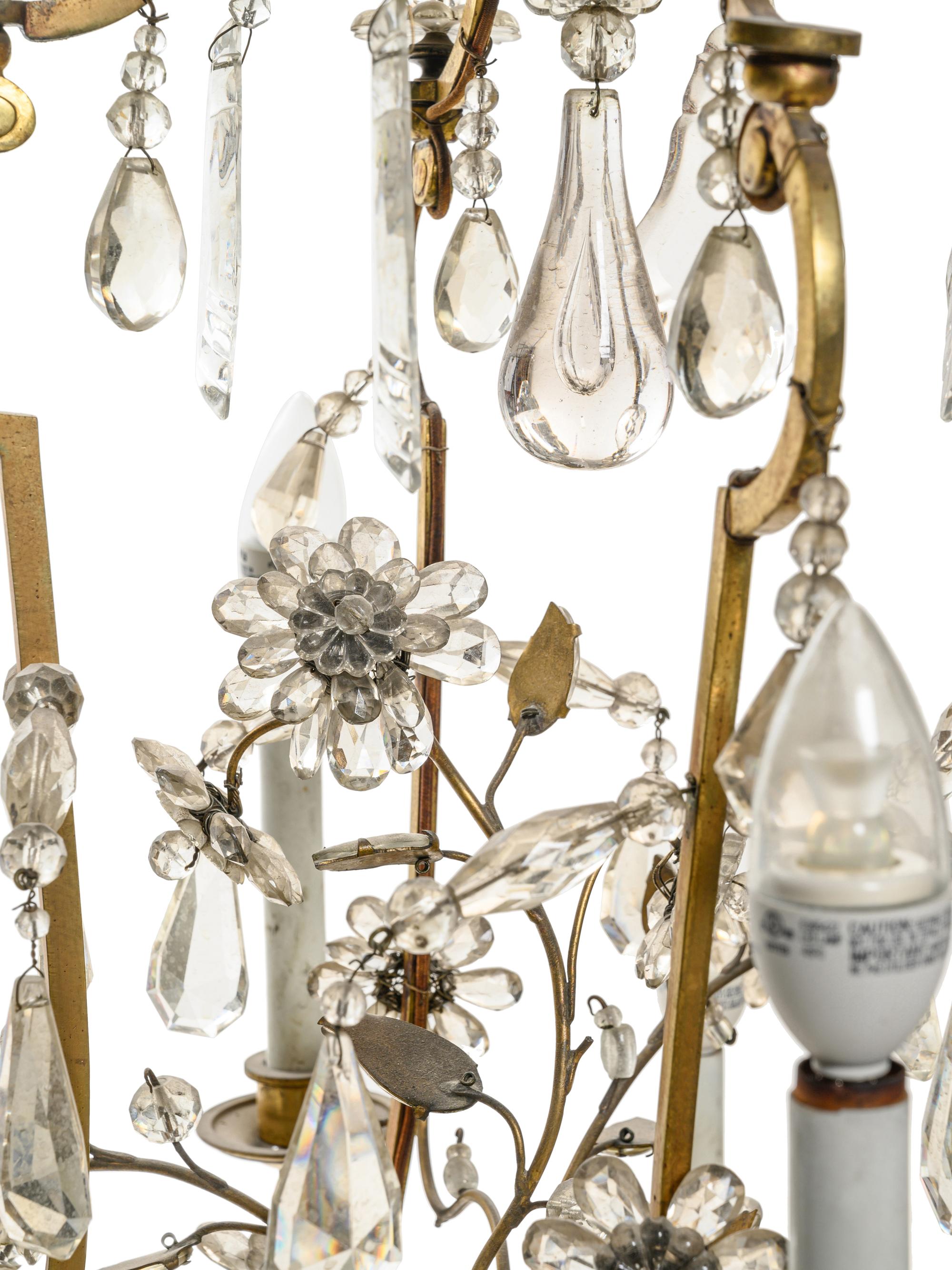 A Pair of French Gilt Bronze and Glass-Beaded Twelve-Light Chandeliers