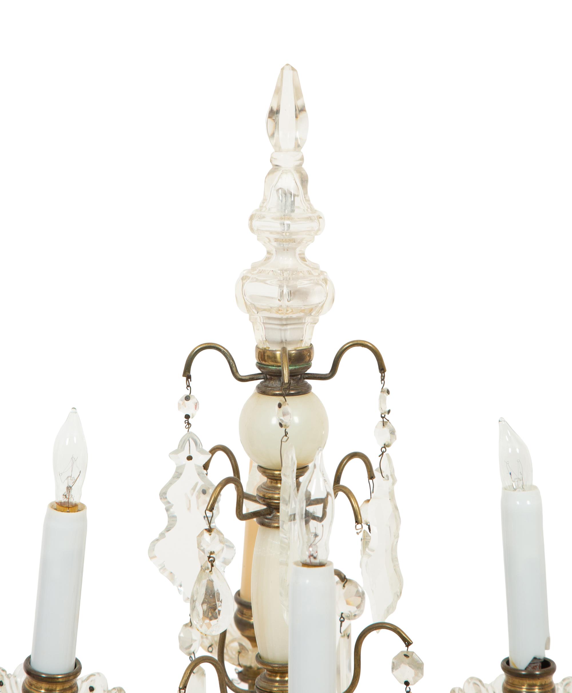A Pair of Gilt Metal, Onyx, and Cut Glass Four Light Girandoles